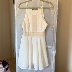 White dress with cream floral pattern